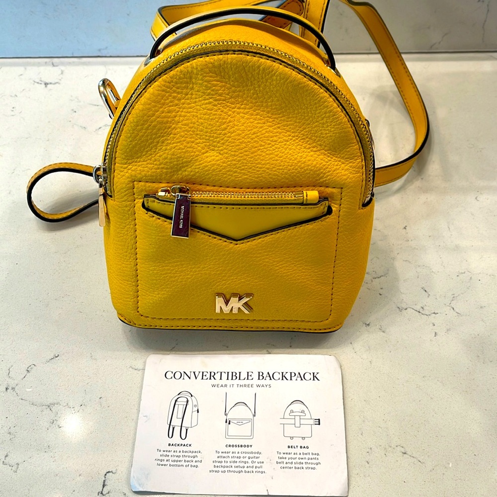 Yellow Mini Michael Kors convertible backpack - gently used